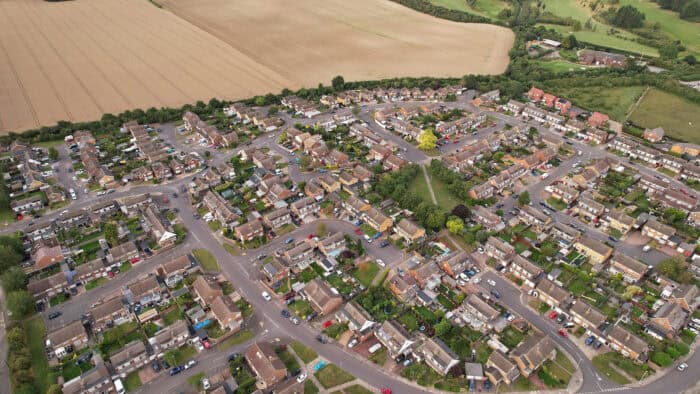 Aerial view of houses. Landlords are essential to the economy.